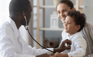 Child being helped by a doctor