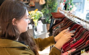 Woman shopping for clothes in a boutique store